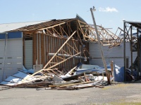 Damage to A&H Equipment Co. near downtown Albertville ~ 472 kb